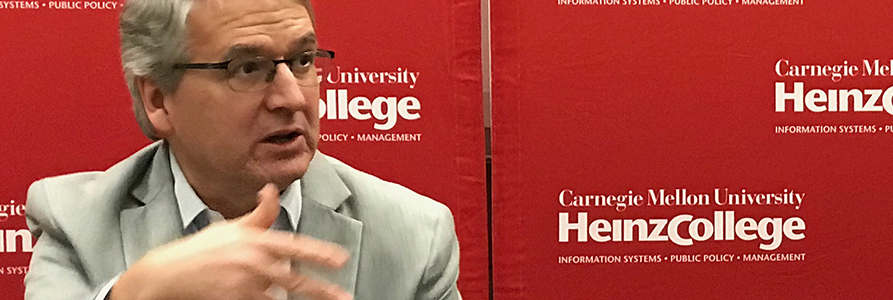 Professor Lowell Taylor speaking in a classroom